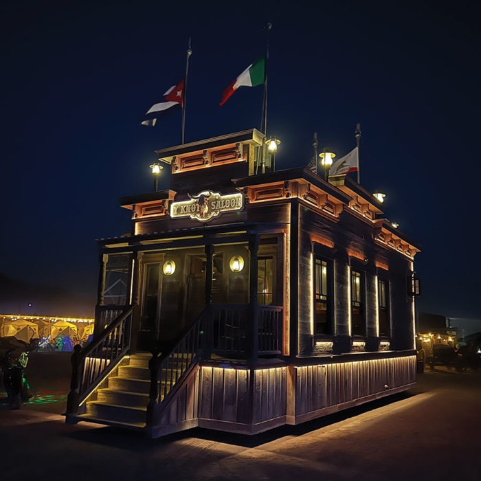 Western-themed art car sculpture fabricated by Engineered Artworks on automotive chassis with steel, wood, and hydraulics